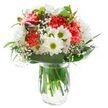 There's a refreshing, cheerful aura in this bouquet that echoes the easygoing spirit of Becontree Heath. At its centre, vibrant coral-hued carnations unfurl like bursts of spring colour, their ruffled petals full of animation and tactile richness. Surrounding them, crisp white chrysanthemums and open-faced daisies with vivid greenish eyes resemble tiny suns, radiating hope and playful energy reminiscent of a bright morning in Mayesbrook Park. Wispy strands of baby's breath delicately bind the blooms together, their airy clusters lending a gentle softness that lightens the entire creation. Discreet magenta alstroemeria buds tuck along one side, offering a hint of surprise and depth-like an unopened gift among familiar treasures. Framing the arrangement, glossy and matte dark green leaves cradle the flowers, anchoring the palette with a comforting depth drawn from the local greenways. Held together in a clear, water-filled glass vase, the stems stand straight and strong, a testament to their garden-fresh origins. Bathed in clean, even light, the bouquet's colours and forms are unobscured-perfect for uplifting spirits, marking milestones, or expressing heartfelt thanks with a local, personal touch in Becontree Heath.